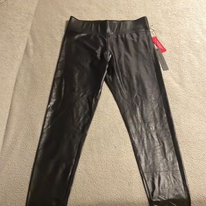 Carbon 38 Black “liquid”/shiny leggings. Never used with tags. XL
